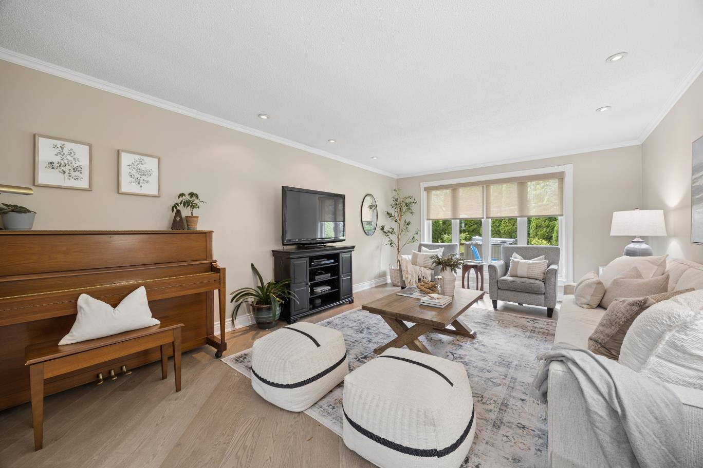 Sunlit living room with hardwood floors at 30 Potters Lane, Clarington