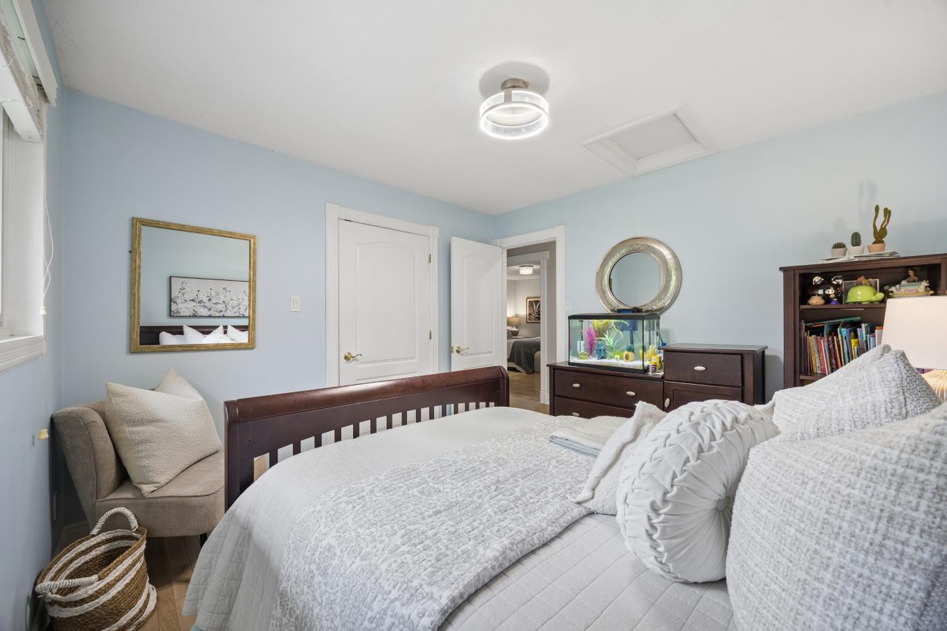 Alternate angle of the primary bedroom suite at 30 Potters Lane