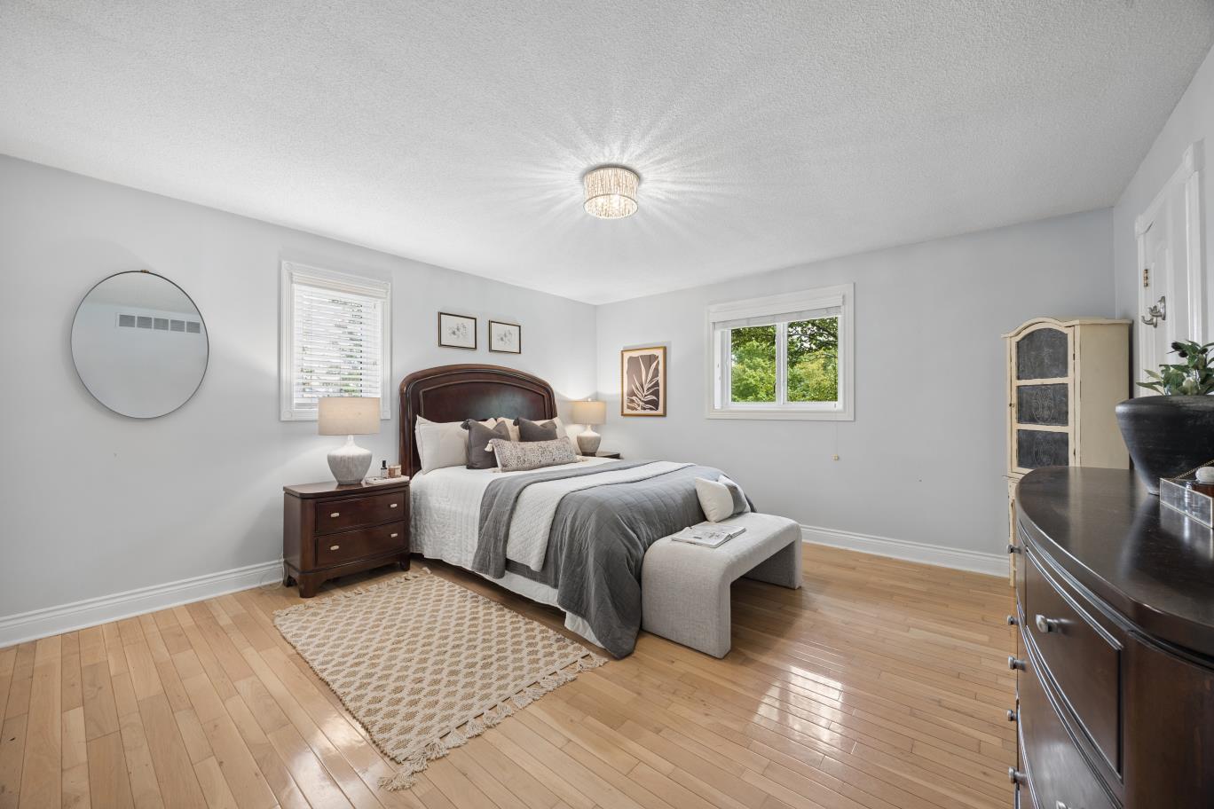 Primary bedroom with backyard views at 30 Potters Lane, Clarington